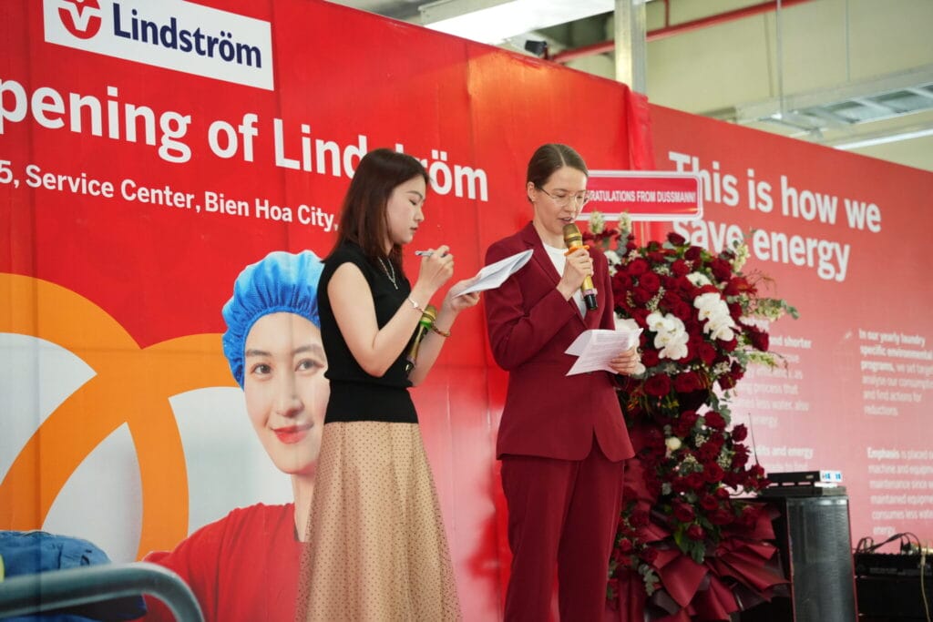 Ms Saramaria Kalkku giving a speech at the Lindström Vietnam opening event