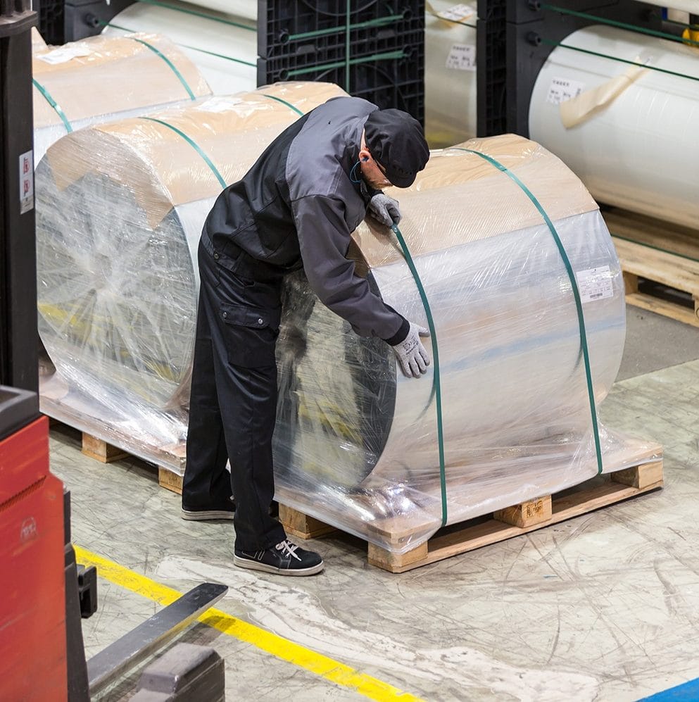 packaging worker wearing workwear overalls