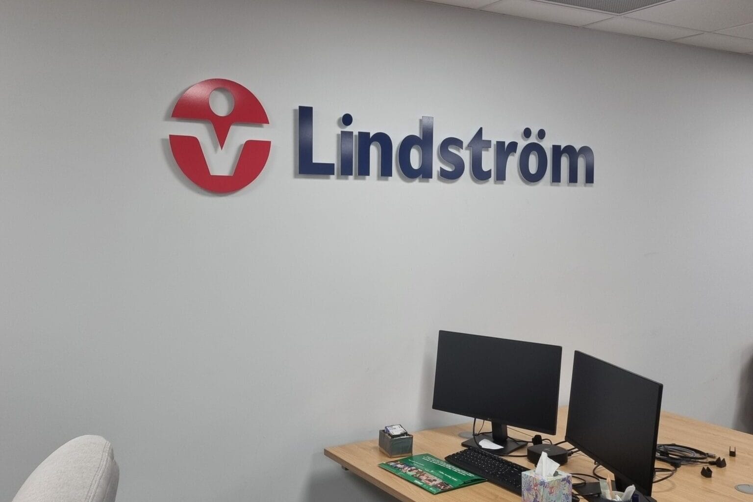Close up of Lindström logo on wall in Lindström's refurbished Bedford office.