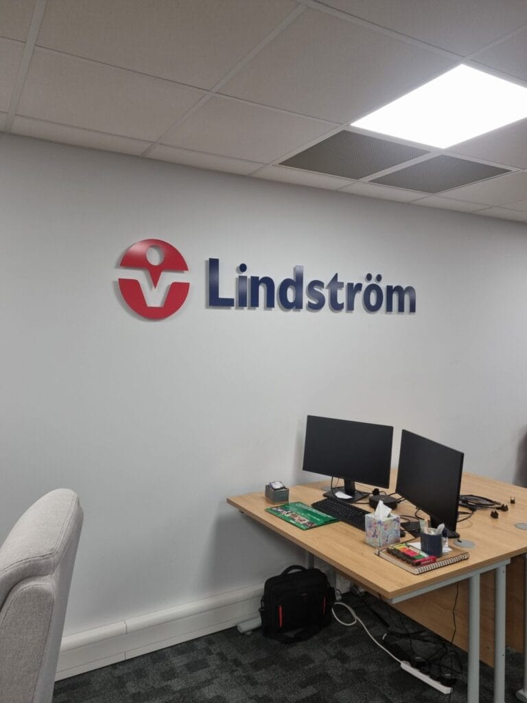 Close up of Lindström logo on wall in Lindström's refurbished Bedford office.