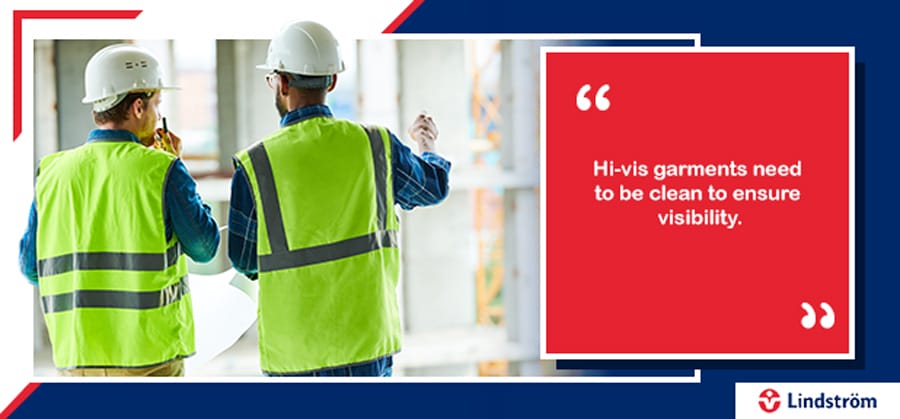 Surveyors wearing clean hi-vis vests