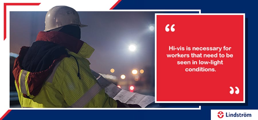 Worker wearing hi-vis clothing at night